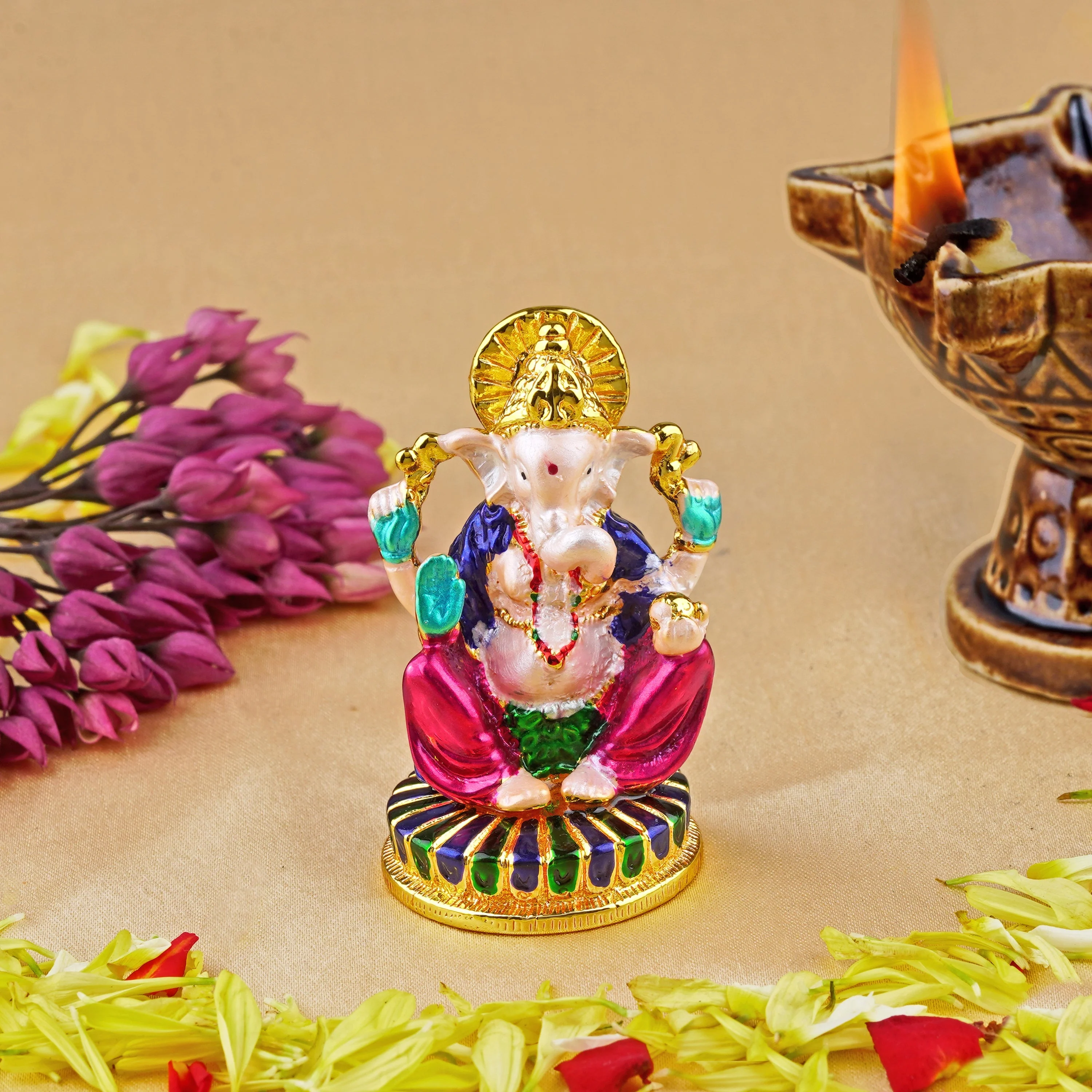 Estele Gold Plated Divine Ganesha With Multi Color Enamel Idol