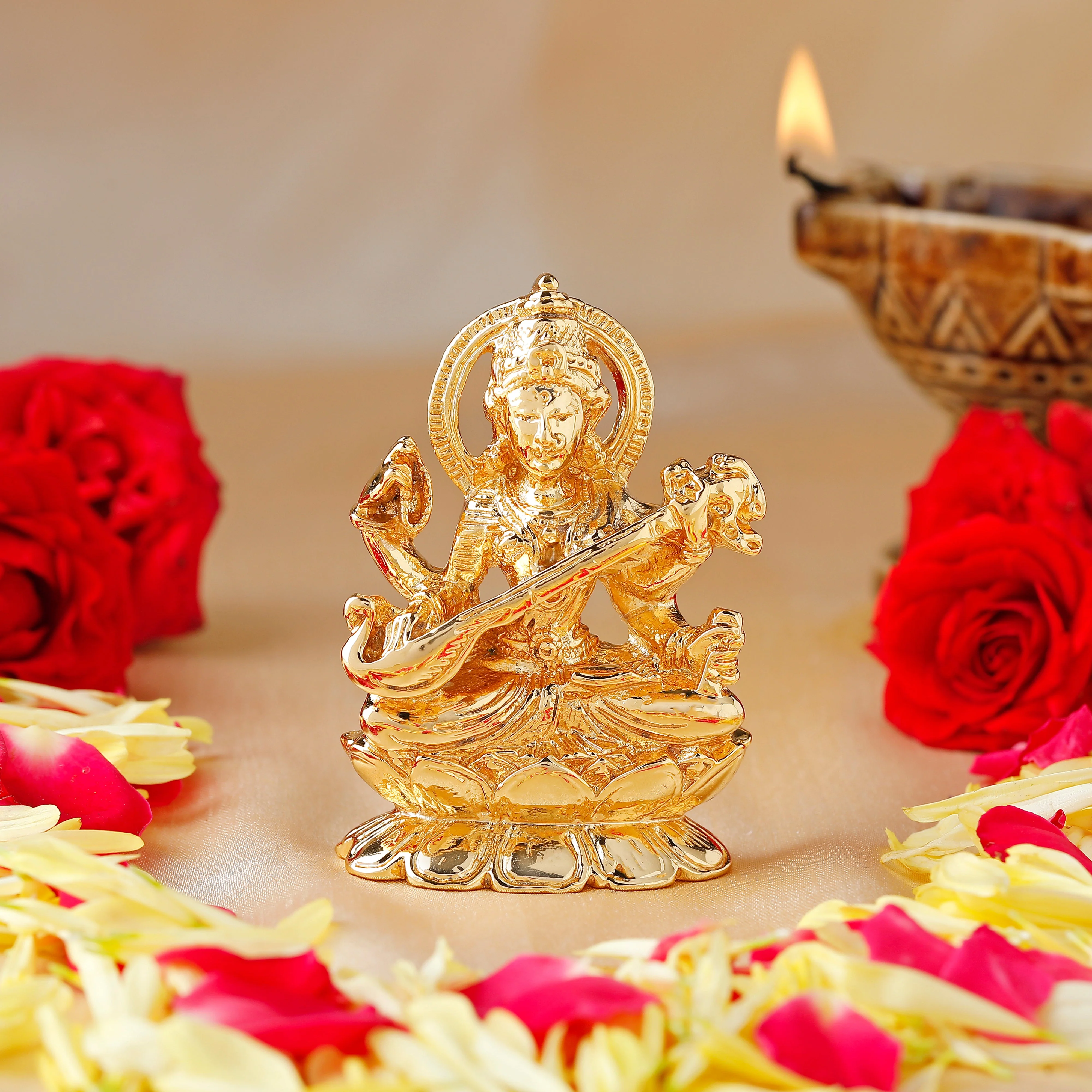 Estele Gold-Plated Goddess Of Knowledge Sarasvati Ma Idol For Pooja & Car Decor.