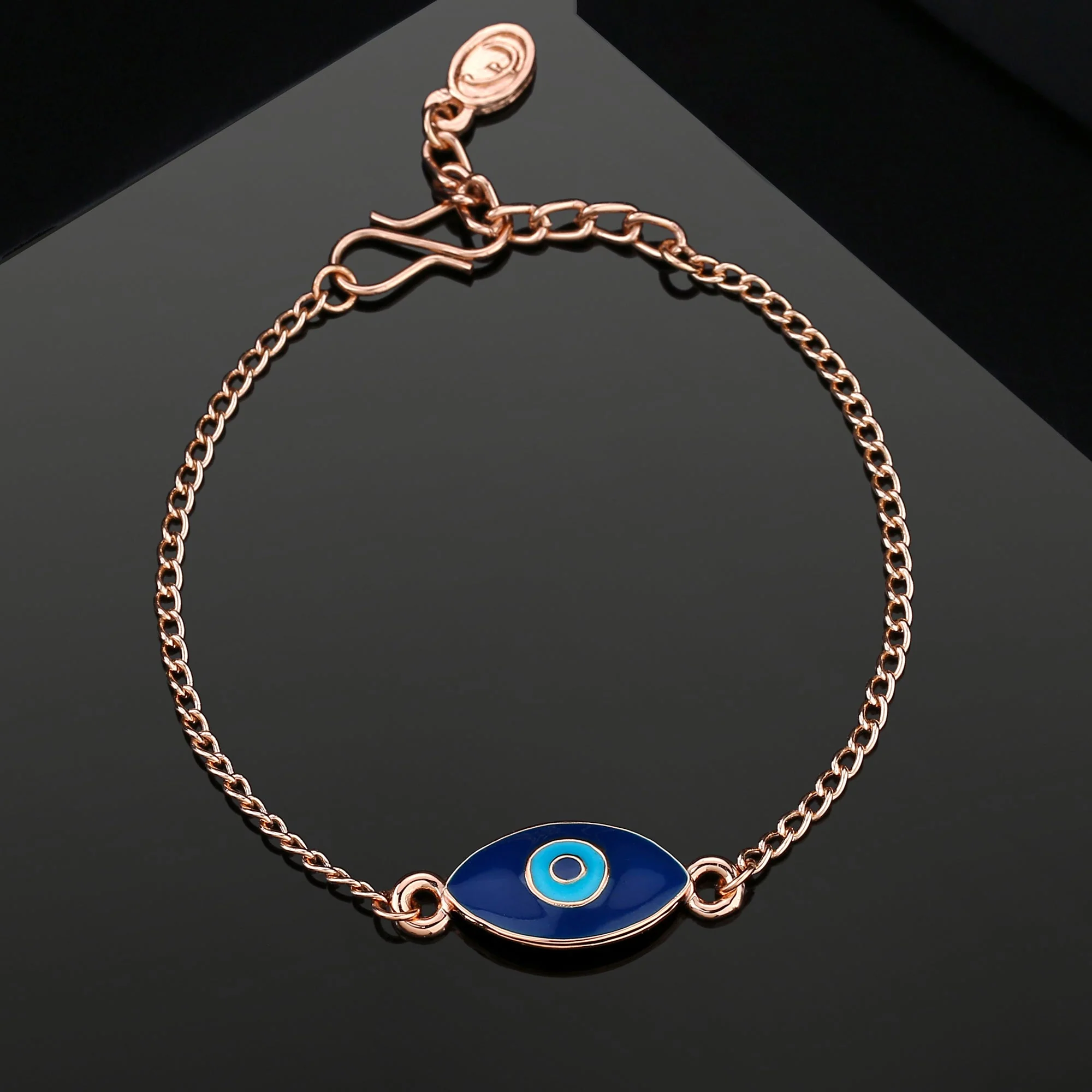 Estele Rose Gold Plated Auspicious Navy Blue Enamel Evil Eye Rakhi Charm Bracelet - Image 11