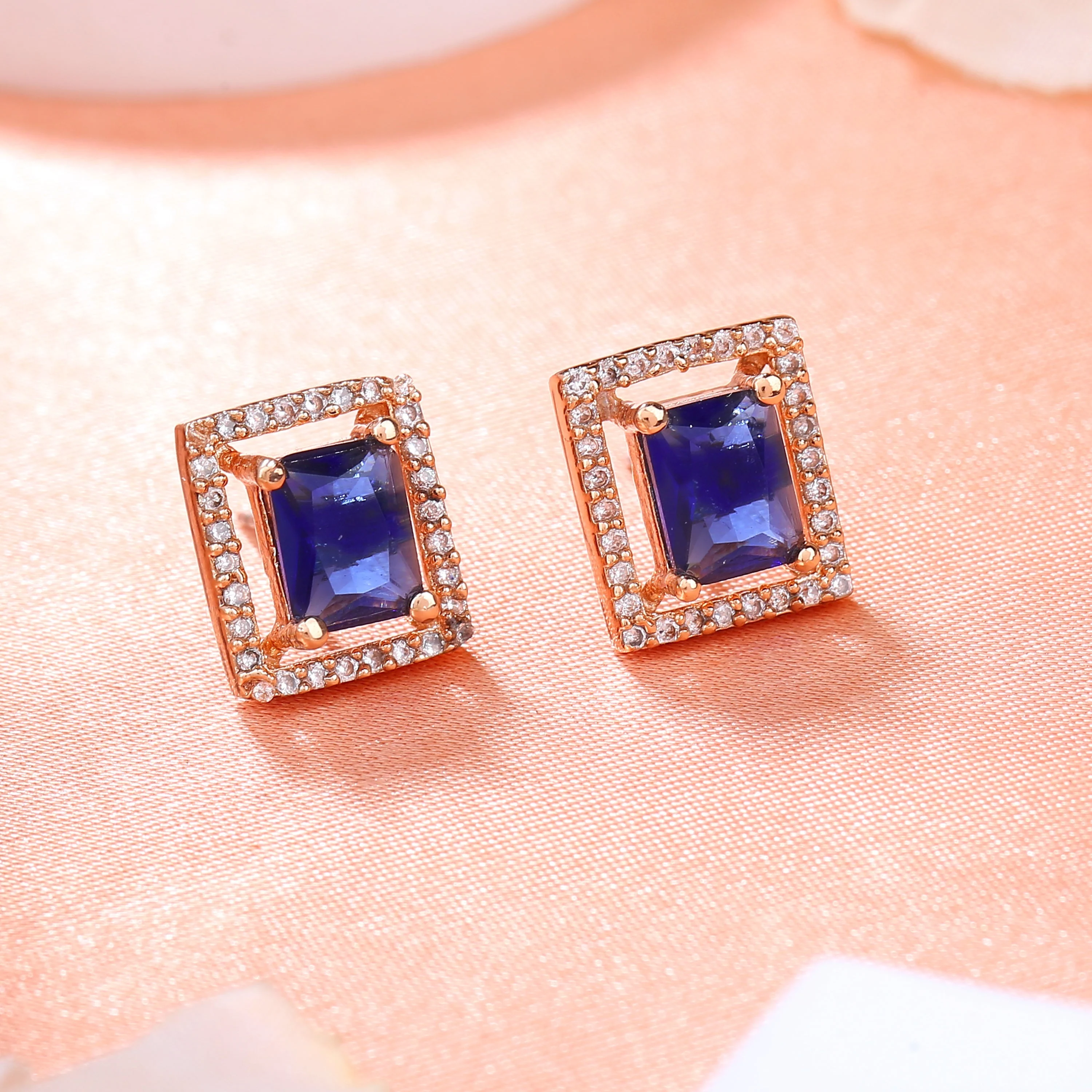 Estele Rose Gold Plated Cz Sparkling Designer Stud Earrings With Blue Crystals For Women