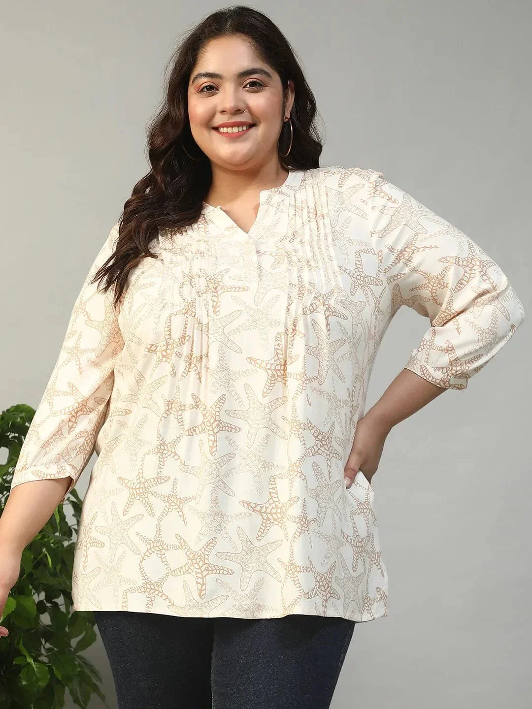 Ethereal Beige Floral Rayon Print Plus Size Women Top With Button Front, Pleated Details, And Long Sleeves.