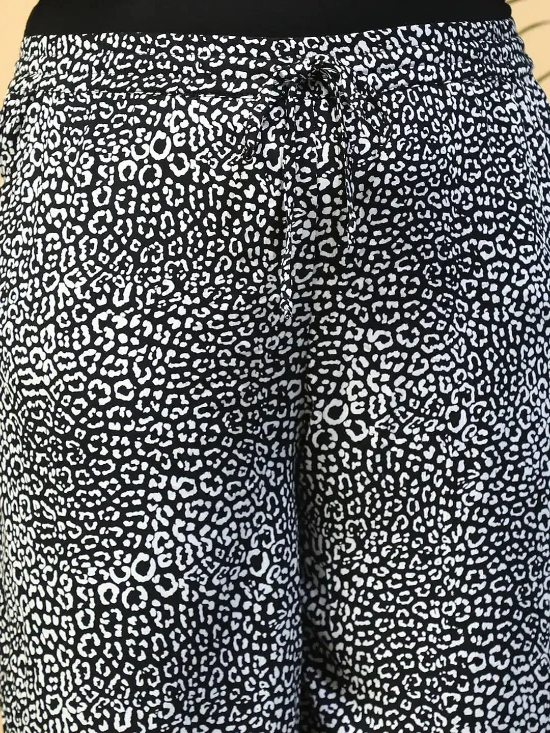 Moonless Black Animal Print Flared Elasticated Waist With Tie-Up Detail Plus Size Women Pant - Image 6