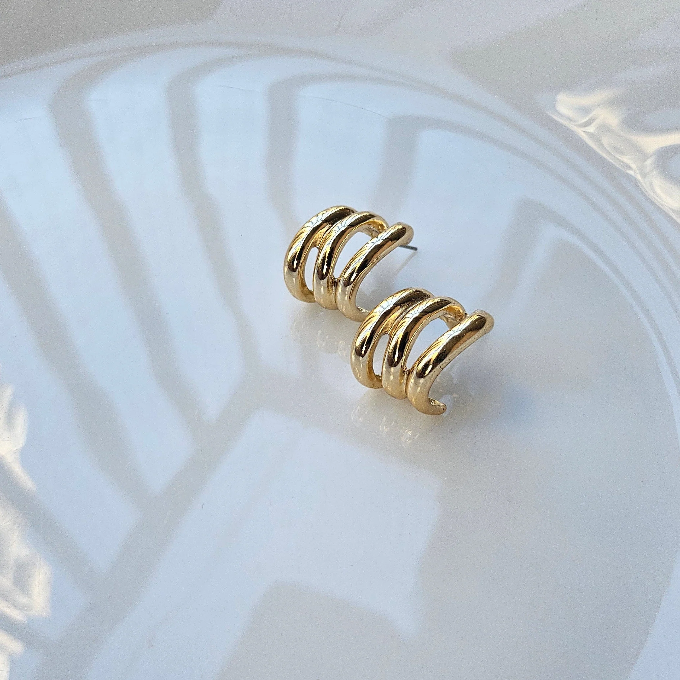 Multi-Ring Golden Huggie Earrings - Modern Statement Hoops - Image 3