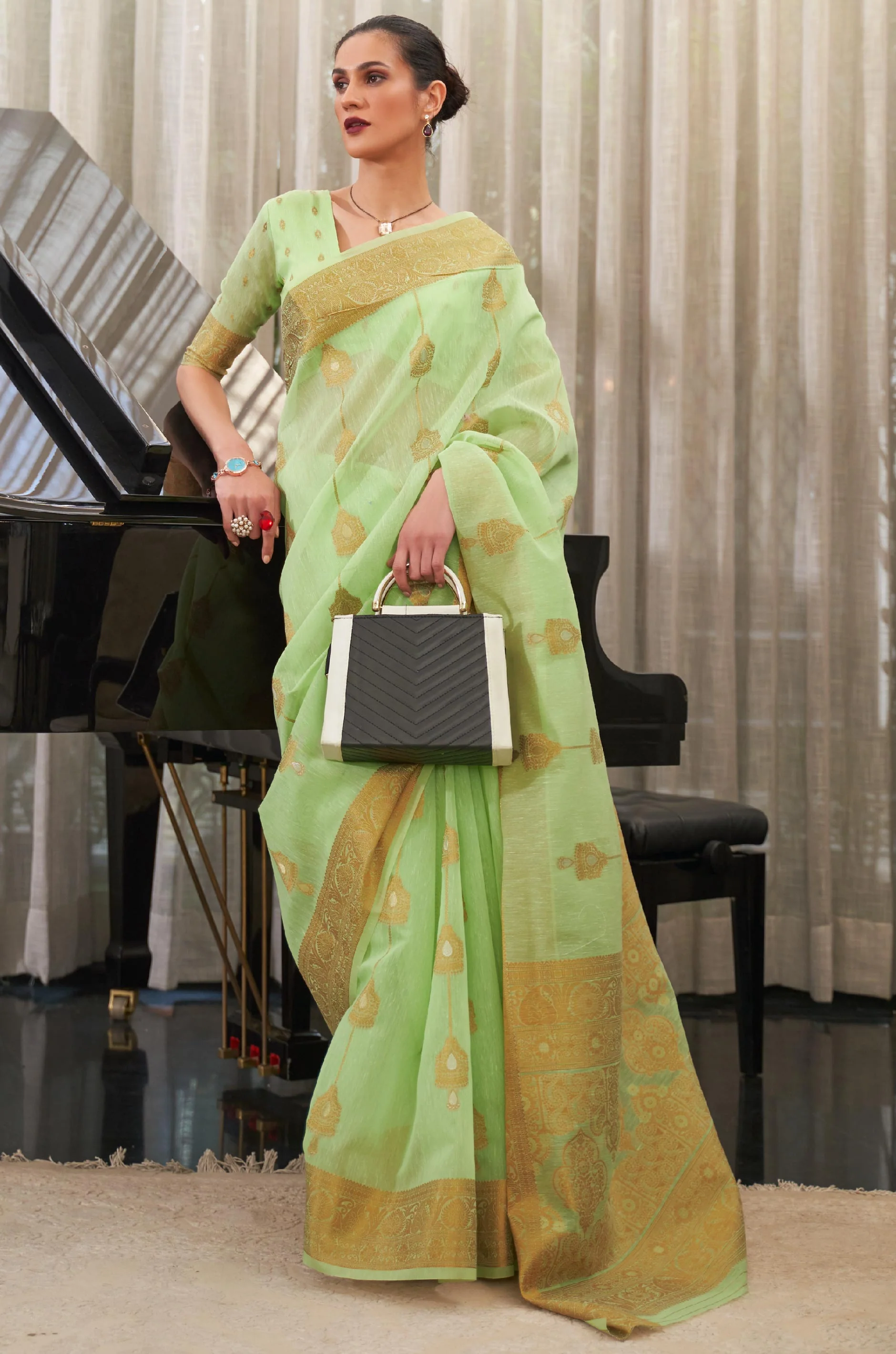 Pastel Green Woven Linen Silk Saree