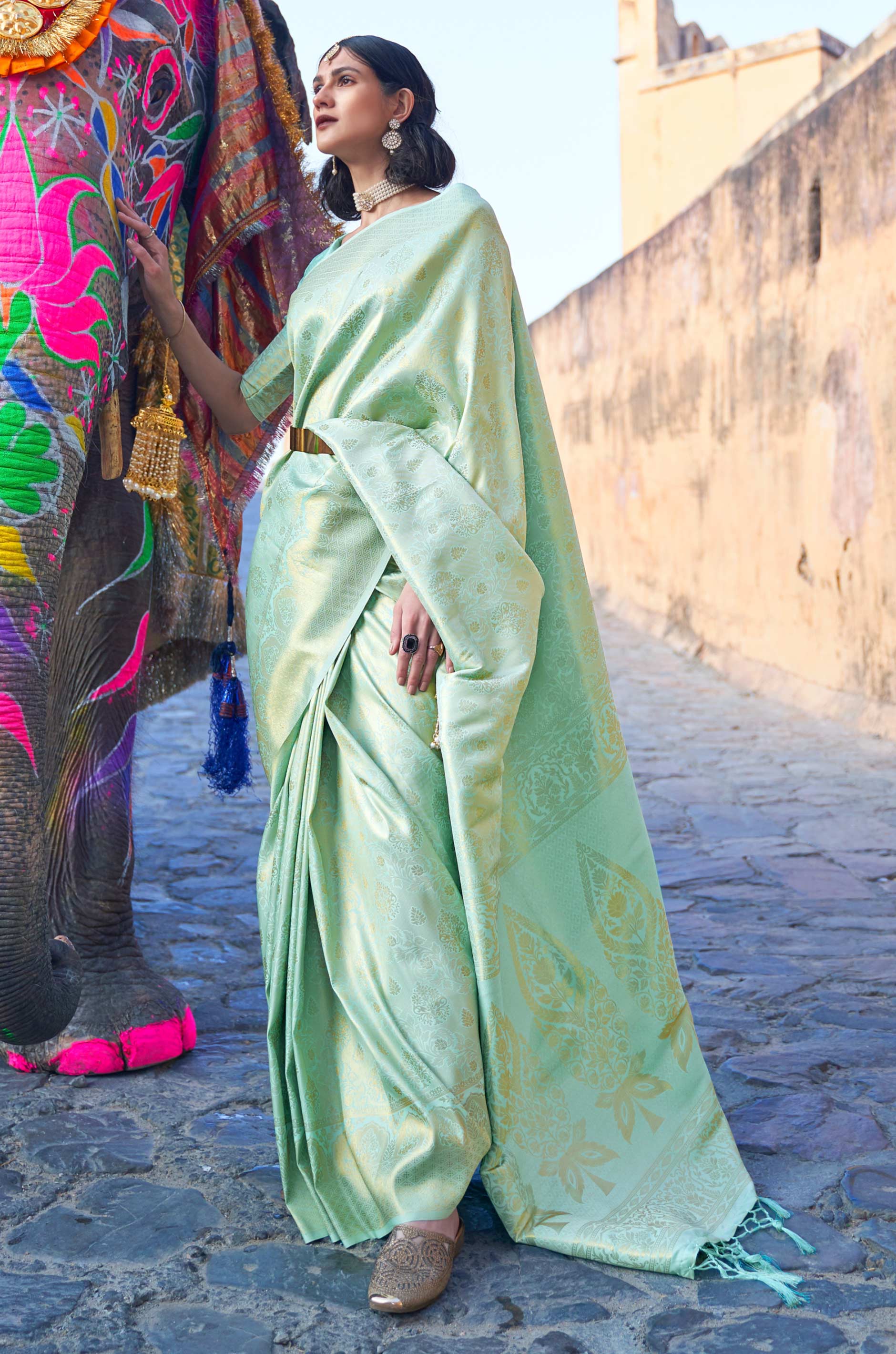 Pista Green Woven Silk Saree